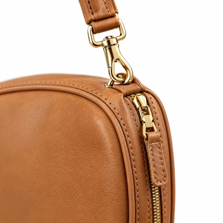 Zip and gold hardware on a leather case
